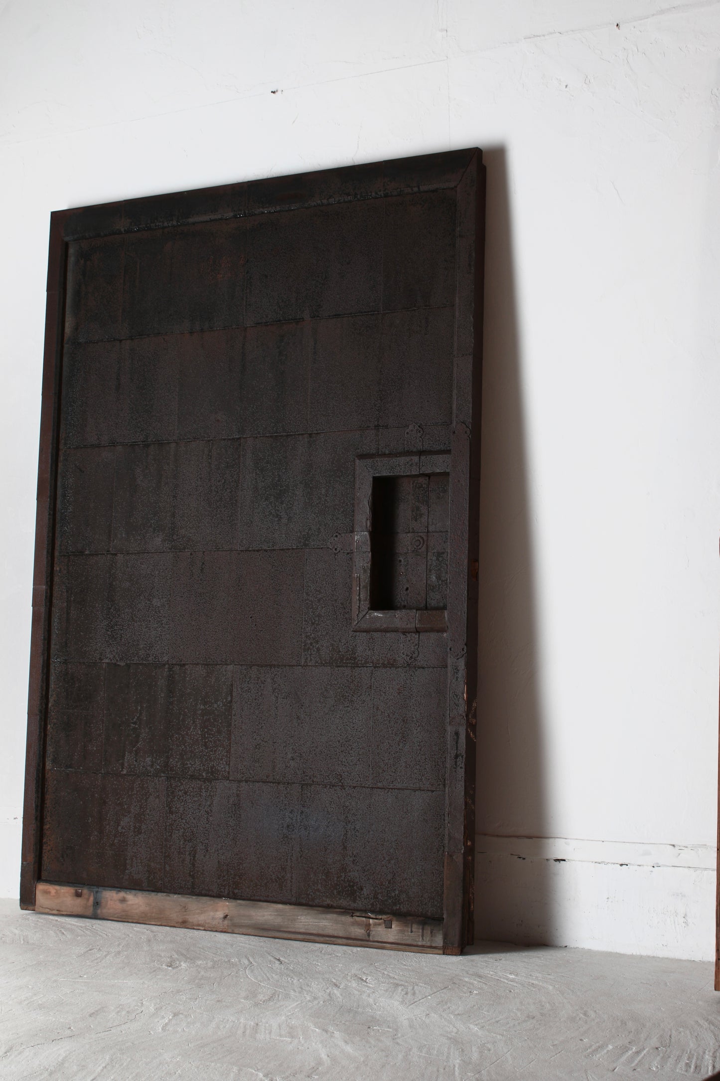 Tin-pasted Door