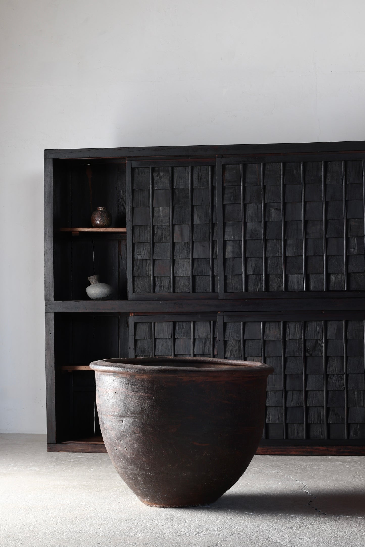 Black Shingle-style Cabinet